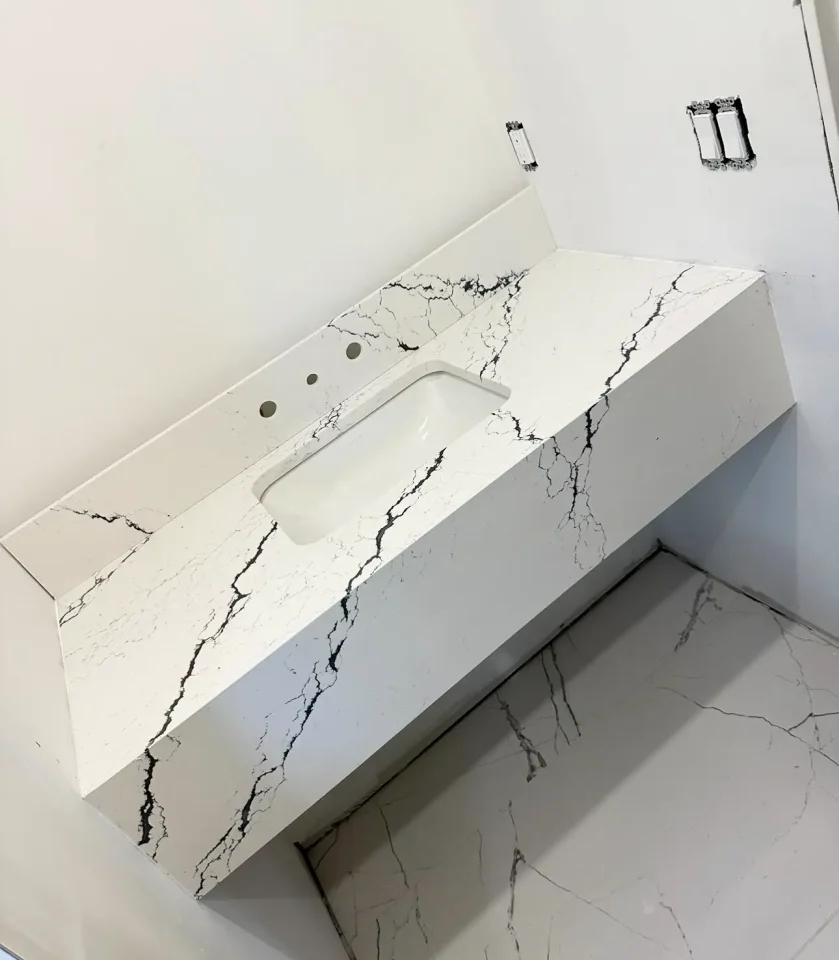 white and black granite bathroom sink
